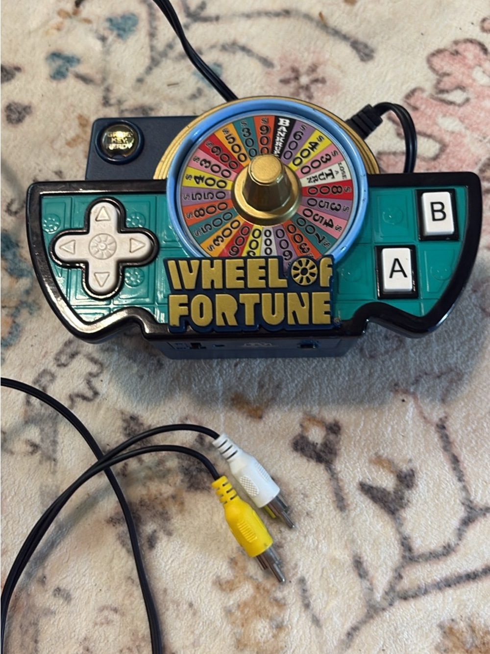 Wheel of Fortune Electronic Game Controller - Teal/Black. Plugs into TV!